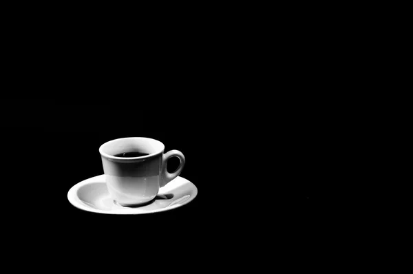 Cup of coffee on black background — Stock Photo, Image