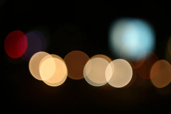 Abstém bokeh borrão de engarrafamento da noite na estrada na cidade . — Fotografia de Stock