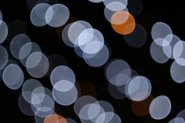 Bokeh borrão abstrato de engarrafamento da noite na estrada na cidade . — Fotografia de Stock