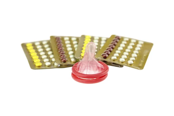 Male condom and oral contraceptive., contraception education concept., isolated on white background. — Stock Photo, Image