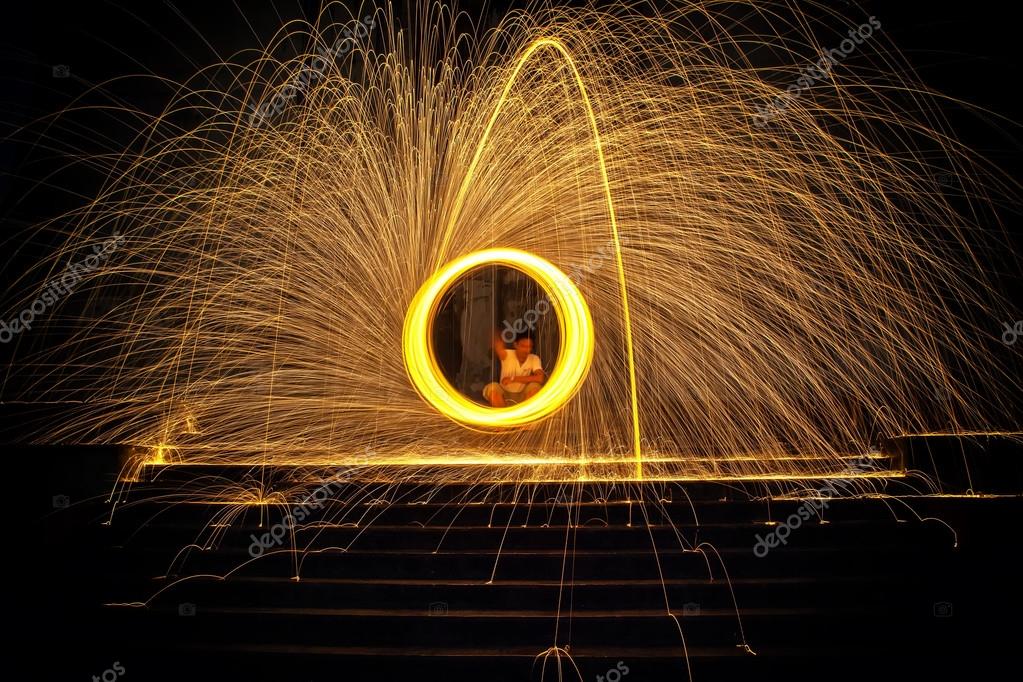Pictures steel wool fire Hot Golden Sparks Flying from Man Spinning Burning Steel Wool on the