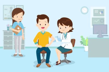 İnsanoğluna koronavirüs aşısı yapan bir klinikte doktor aşısı. İnsanlar için başarılı bir covid 19 aşısı..