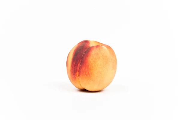 Peach with a white background. — Stock Photo, Image