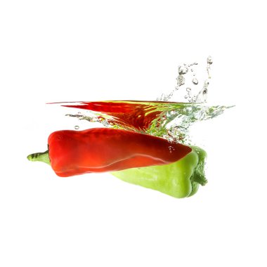 Peppers splash on water, isolated on white background