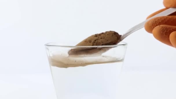 Dip Spoon Containing Cocoa Powder Glass Water Experimental Concept Water — Stock Video