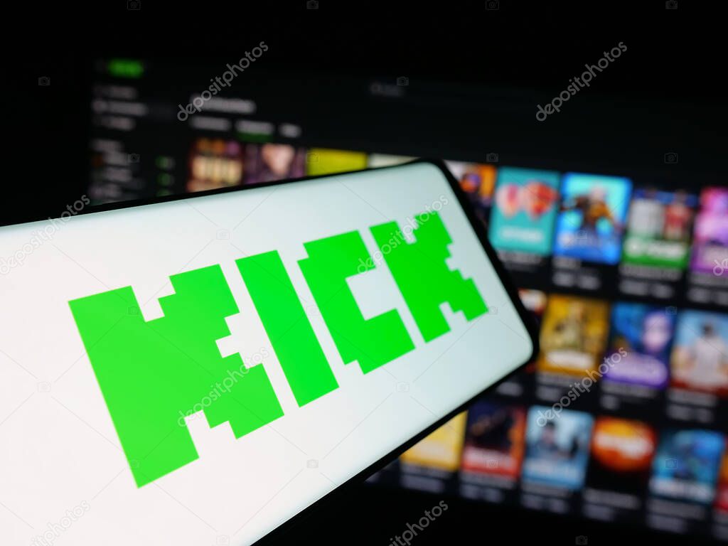 Stuttgart, Germany - 10-06-2025: Smartphone with logo of video livestreaming platform company Kick.com on screen in front of website. Focus on center-left of phone display.
