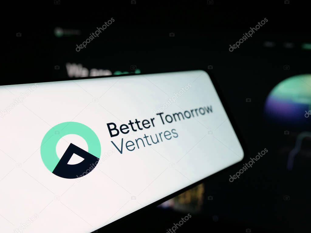 Stuttgart, Germany - 10-18-2025: Smartphone with logo of US company Better Tomorrow Ventures (BTV) on screen in front of website. Focus on left of phone display.