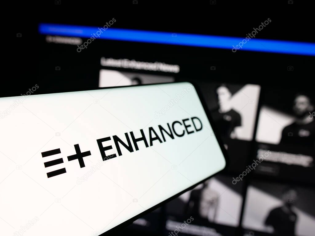 Stuttgart, Germany - 11-02-2025: Smartphone with logo of multi-sport event Enhanced Games on screen in front of website. Focus on center-left of phone display.