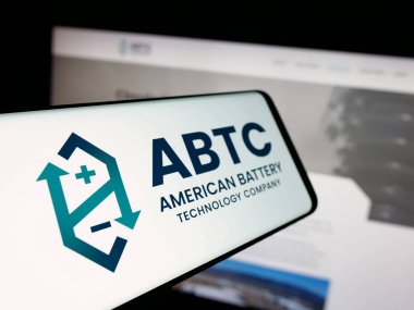Stuttgart, Germany - 11-04-2025: Smartphone with logo of American Battery Technology Company (ABTC) on screen in front of website. Focus on center-left of phone display.