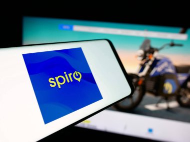Stuttgart, Germany - 11-06-2025: Smartphone with logo of Kenyan electric vehicle company Spiro on screen in front of website. Focus on center-left of phone display.