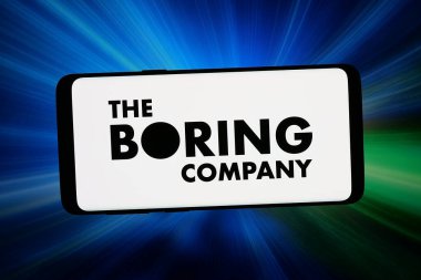 Stuttgart, Almanya - 03-09-2026: Bu fotoğraf gösteriminde, Tünel inşa işinin logosu Sıkıcı Şirket bilgisayar ekranında soyut bir arkaplanda akıllı bir telefonla gösteriliyor.