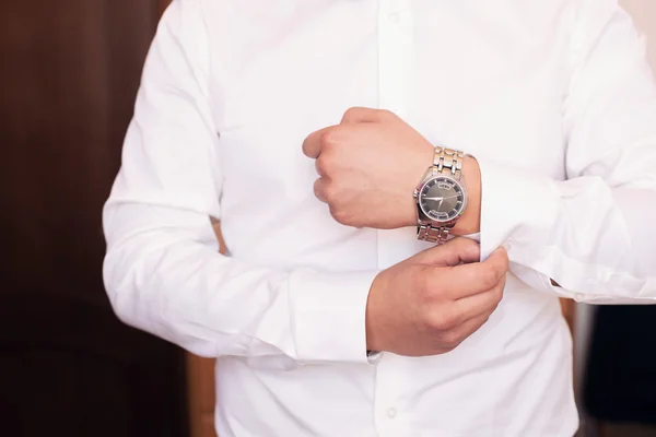 Watch on a hand at the man — Stock Photo, Image