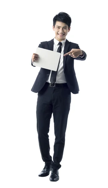 Hombre de negocios sostiene papel en blanco — Foto de Stock