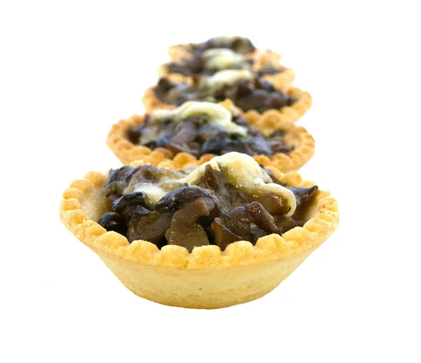 Tartlets mantar ve peynir. İzole.