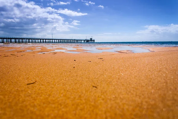 Brillante Arena Con Point Lonsdale Jetty Fondo Fotos de stock