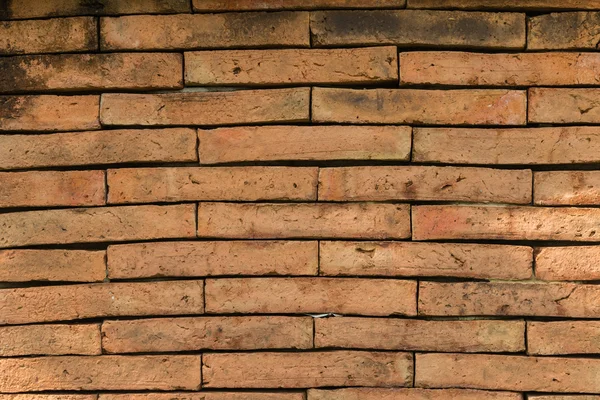 Closeup of the weathered red brick wall — Stock Photo, Image