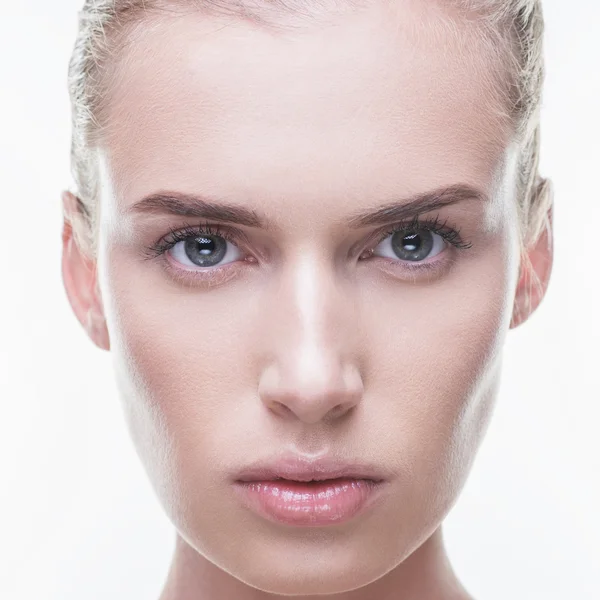 Young beautiful girl with clean skin on white background — Stock Photo, Image