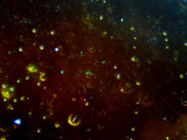 BHO 'nun fotoğrafı, ama kendinden yapılmış haşhaş yağı. Fotoğraf: mikroskop, serval efektli.