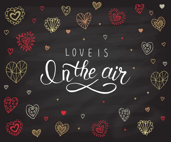 Hand sketched 'Love is in the air text'. Valentine's Day typograph — ストックベクタ