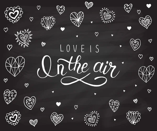 Hand sketched 'Love is in the air text'. Valentine's Day typograph — ストックベクタ