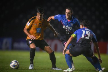 Futbol oyuncuları, Tayland 'daki Buriram Stadyumu' nda Kitchee SC ile Port FC arasında oynanan AFC Şampiyonlar Ligi 2021 J Grubu karşılaşmasında görüldüler. (final skoru; Kitchee SC 2: 0 Port FC)