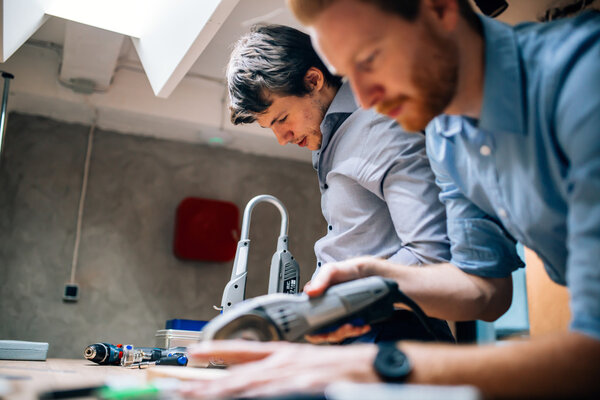 Joiners working in workshop