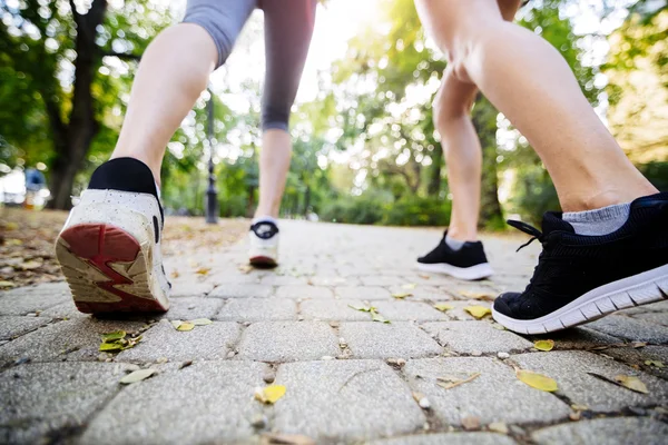 Jogger's feet in action and running — Stock Photo, Image