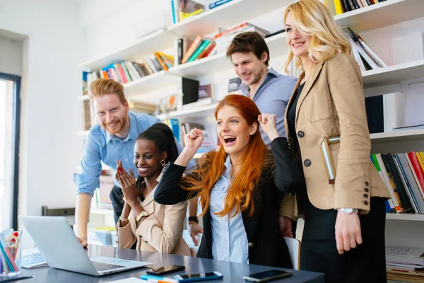 Happy business coworkers celebrating — Stock Photo, Image