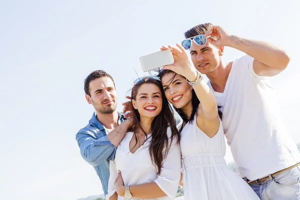 Group of young people taking photos — Stock Photo, Image