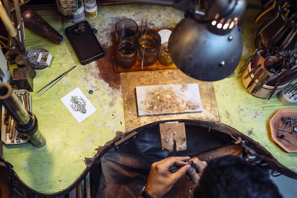 Craftsman working on workbench