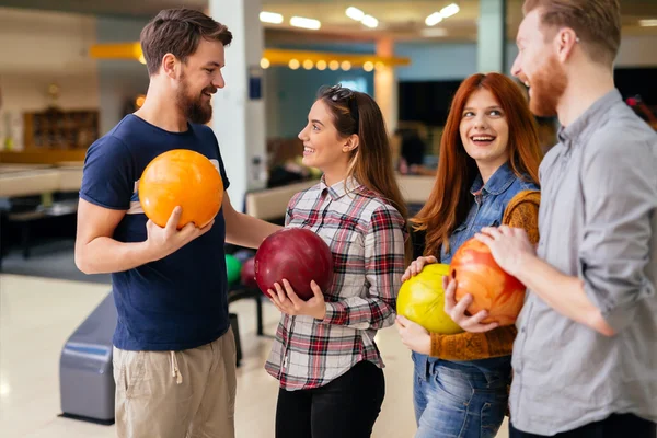 Friends having great time playing bowling — Stock Photo, Image
