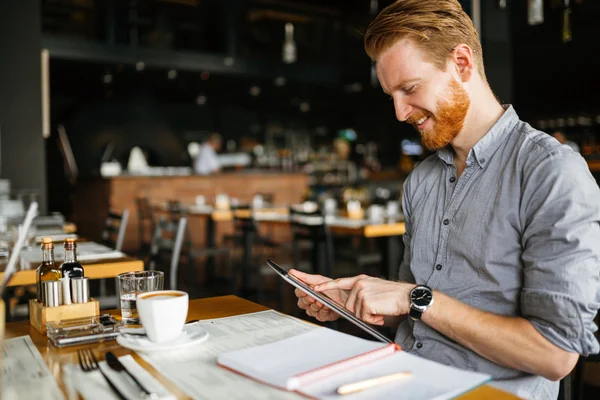 Businessman holding tablet