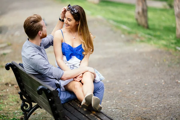 Romantic couple in park — Stock Photo, Image