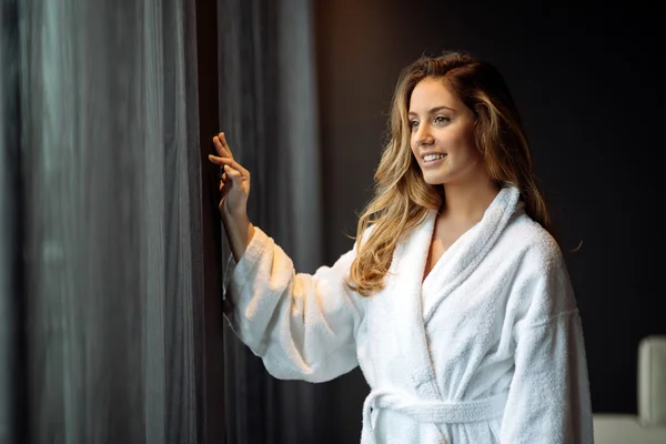 Stunning woman in bathrobe