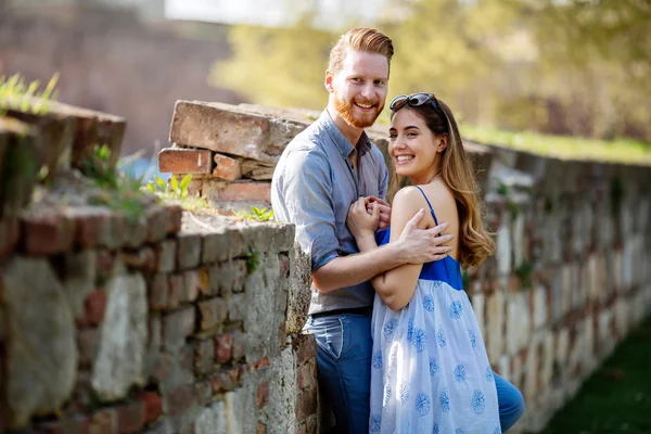 Beautiful couple hugging in park — Stock Photo, Image