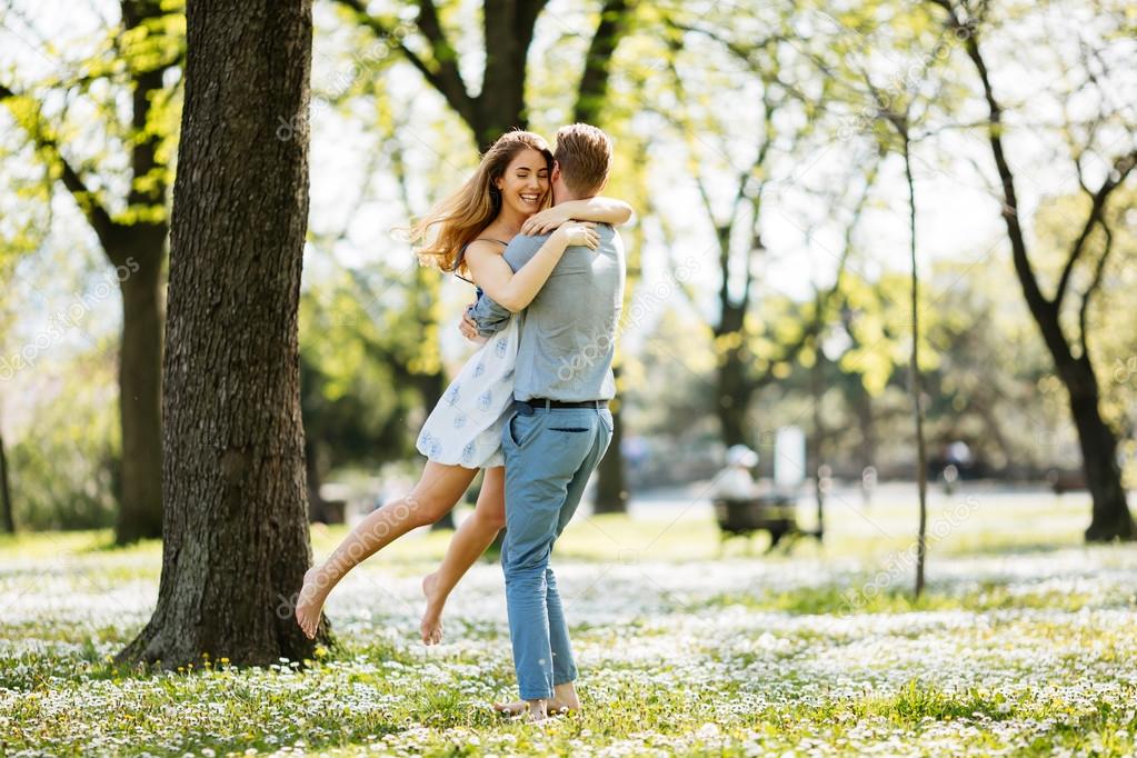 Man spinning his girlfriend — Stock Photo © nd3000 109127648