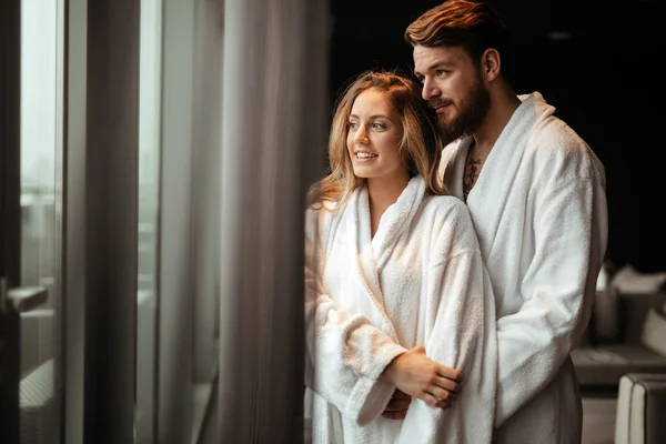 Couple relaxing in bathrobe — Stock Photo, Image