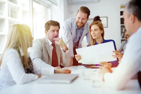 Businesspeople and architects planning — Stock Photo, Image