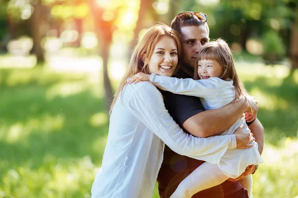 Family happy with adopted child — Stock Photo, Image