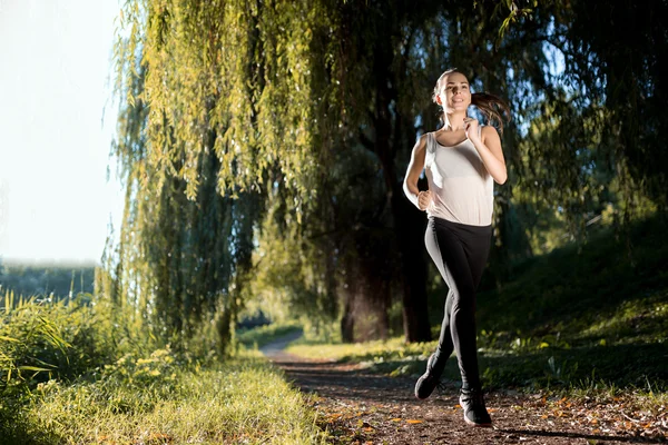 Sportovní žena jogging — Stock fotografie