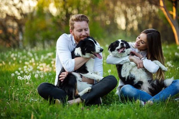 Young Happy Couple Playing Dogs Having Fun Park Outdoor — Stock Photo, Image