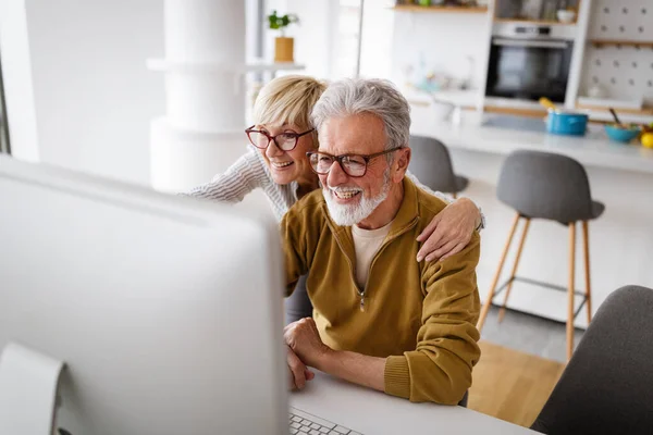 Cheerful Happy Senior Couple Using Technology Devices Having Fun Home — Stock Photo, Image