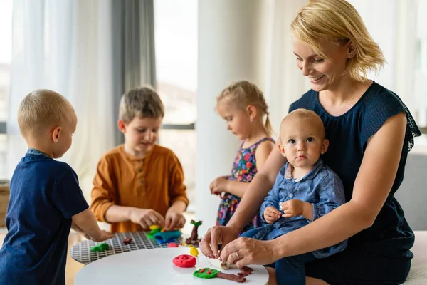 Mother Nursery Teacher Teaches Her Children Work Colorful Play Clay — Stock Photo, Image