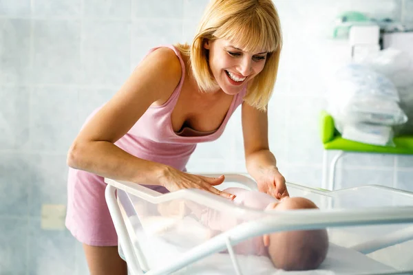 stock image Little baby and mother in hospital. New life concept.