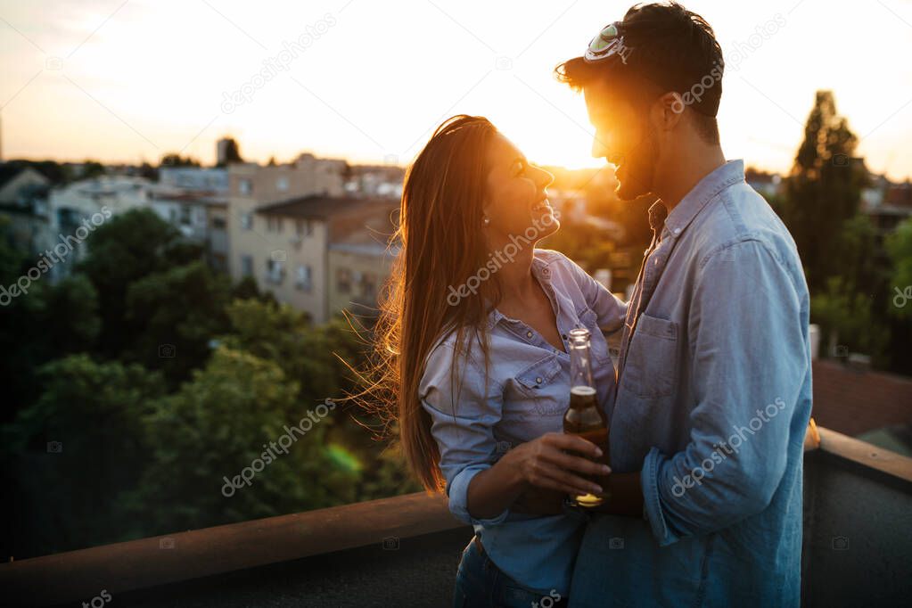 Happy cheerful loving couple having fun together on date outdoor