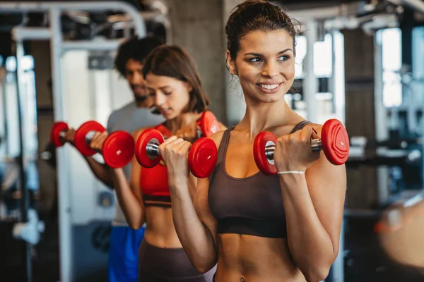 Fitness, Sport, Training, Gym And Lifestyle Concept - Group Of Women  Working Out In Gym Stock Photo, Picture and Royalty Free Image. Image  30613553.