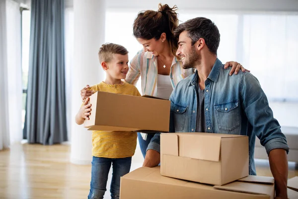 Family Unpacking Cardboard Boxes New Home New House Family Insurance — Stock Photo, Image