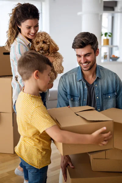 Happy Family Unpacking Boxes New Home Moving Day People Real — Stock Photo, Image
