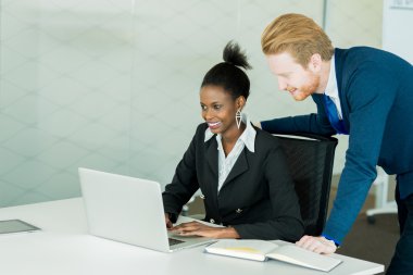 Businesspeople discussing and brainstorming in an office