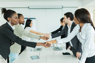 Businesspeople shaking hands clipart